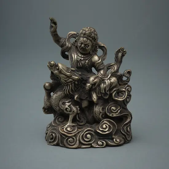 Chinese/Tibetan Vaiśravaṇa white metal alloy figure,